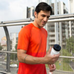 Atleta che corre e si disseta con Argivit